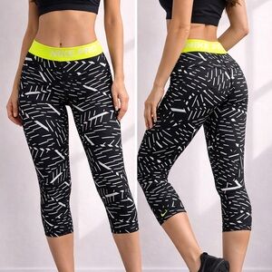 Nike Black Capri Leggings with Neon Yellow Waistband